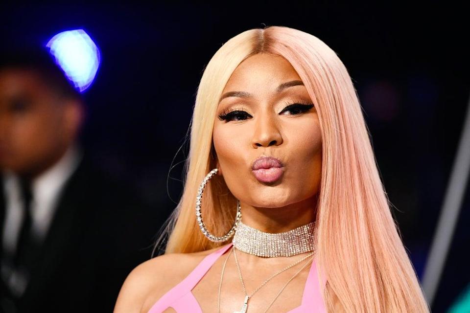 American Rapper Nicki Minaj Poses On Top Nude Men As She Speaks About Being An Independent 0021