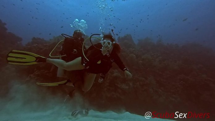 SCUBA Sex Quickie while on a deep dive exploring a coral reef